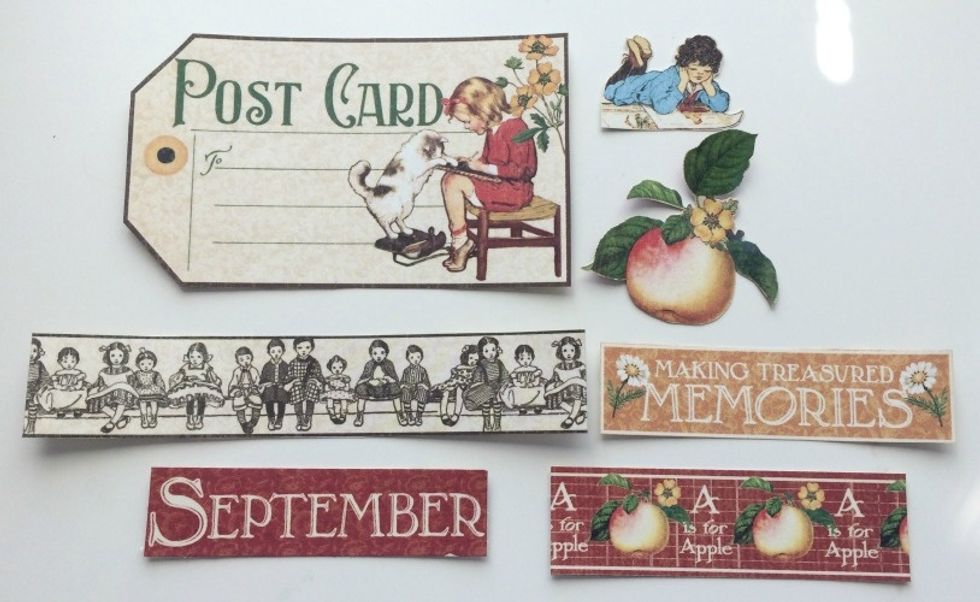 From the September Collective paper, cut apart the Post card, Children border, Making Memories sentiment, September title and fussy cut the little girl reading. From the Montage paper - cut out apple.