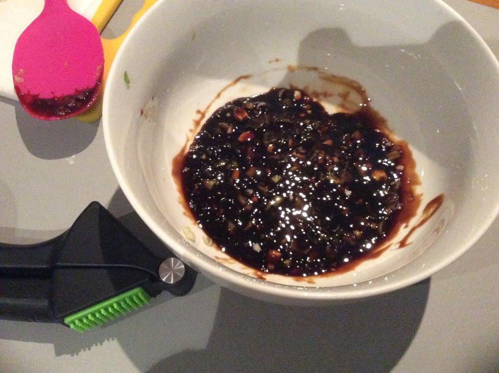 From the smooth past you just made put it back in the bowl and place the kecap manis on top