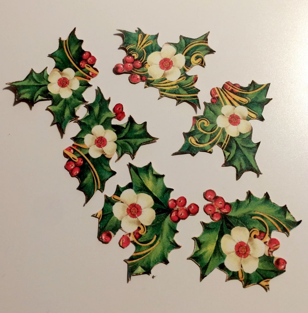 From the St.Nicholas paper, cut six holly bunches out.