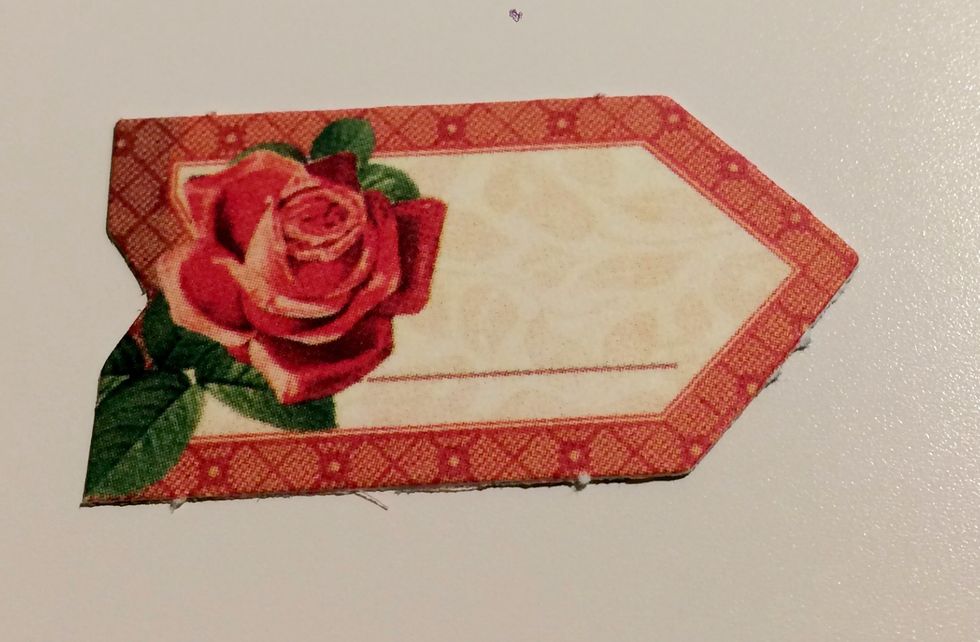 From the Tags and Pockets, punch out the arrow with the rose on it.