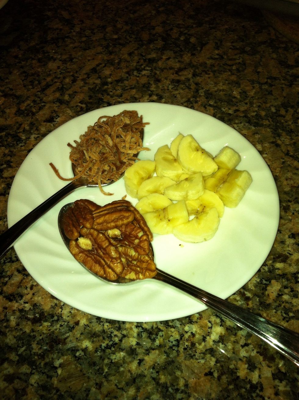From the time I stopped the toaster and got the coconut out it continued to brown...  I added this photo so you can see the toasted coconut colour.