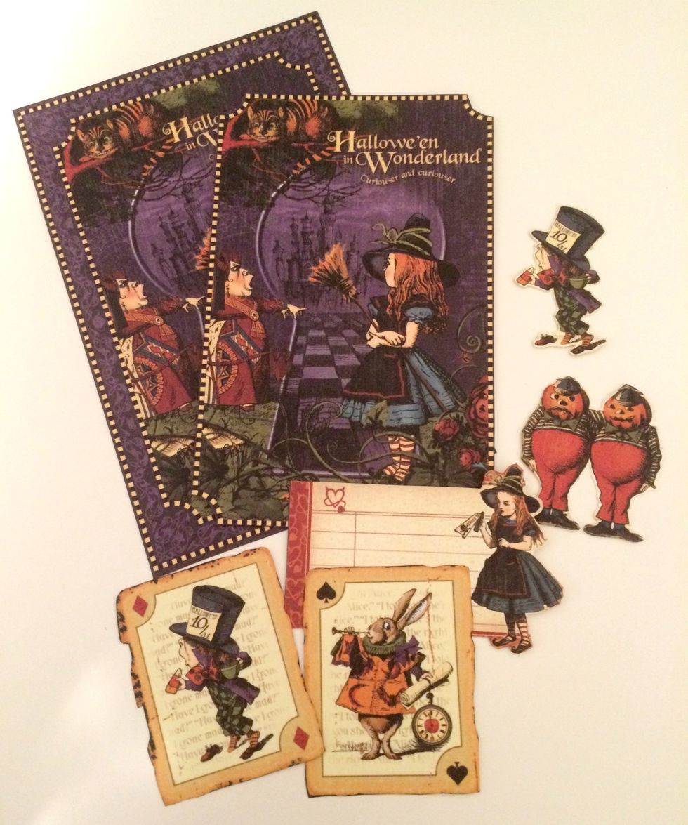 From the Tweedledee & Tweedledum paper, cut out 2-playing cards, Alice tag, mad hatter, 2- Hallowe'en in Wonderland Cards and Tweedledee & Tweedledum. Fussy cut one of the Hallowe'en cards.