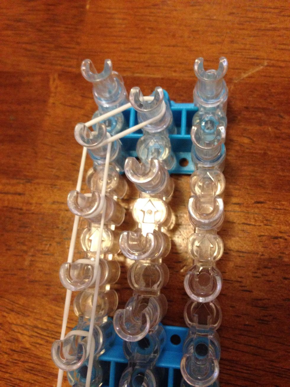 From there add a band to the last middle pin.