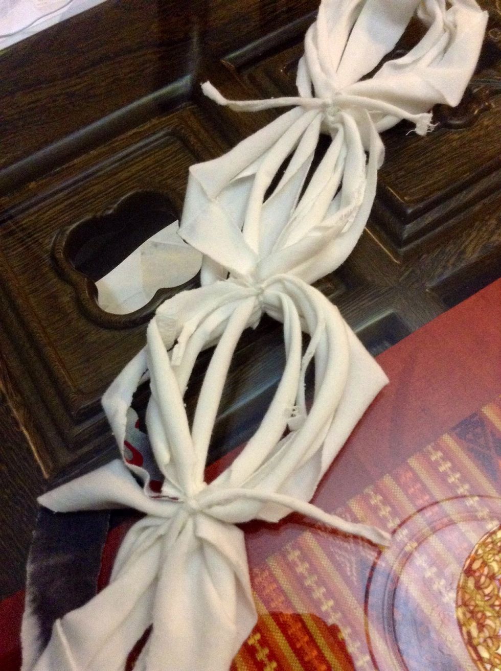 From there just continue tying the rings together!