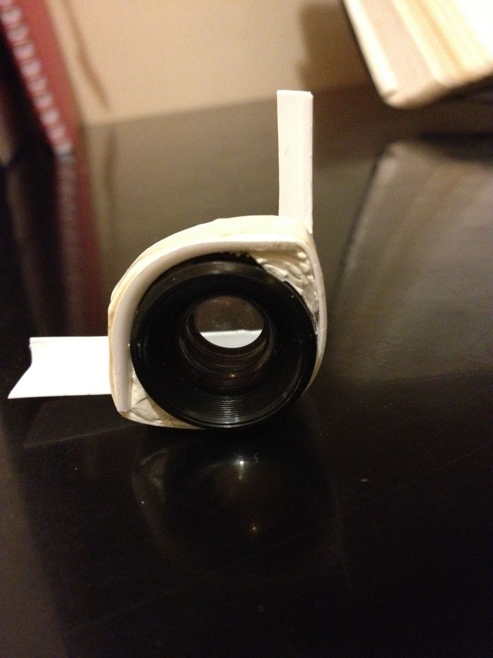 Front view: notice how the blu-tack fill up space around the lens