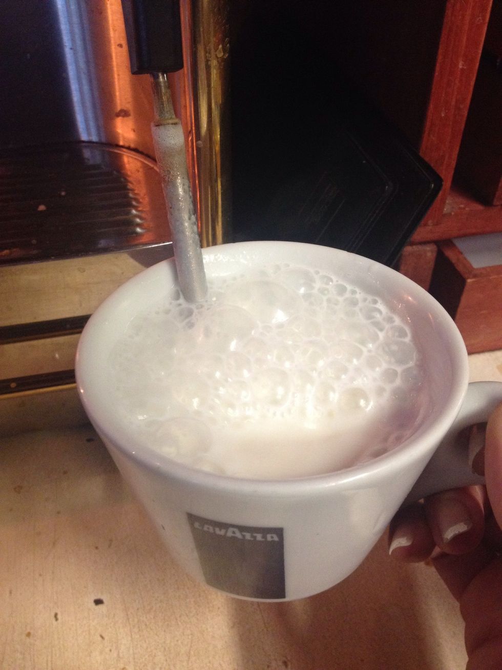 Froth milk as you would for steamed milk or to make a latte or cappuccino