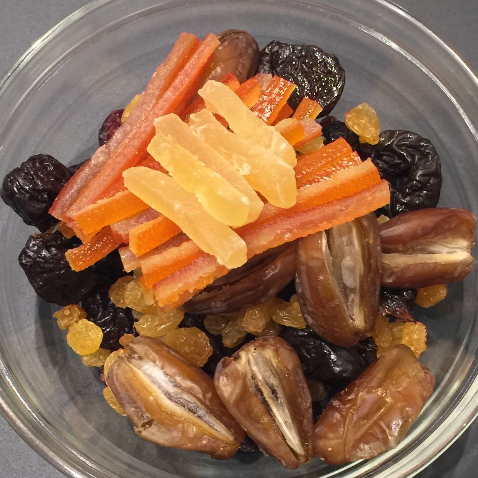 Fruits of your choice. I used what I had: raisins, cranberries, dates, prunes, candied orange peel, and candied ginger. Cut them into small cubes and soak them overnight. Or for 8 hrs