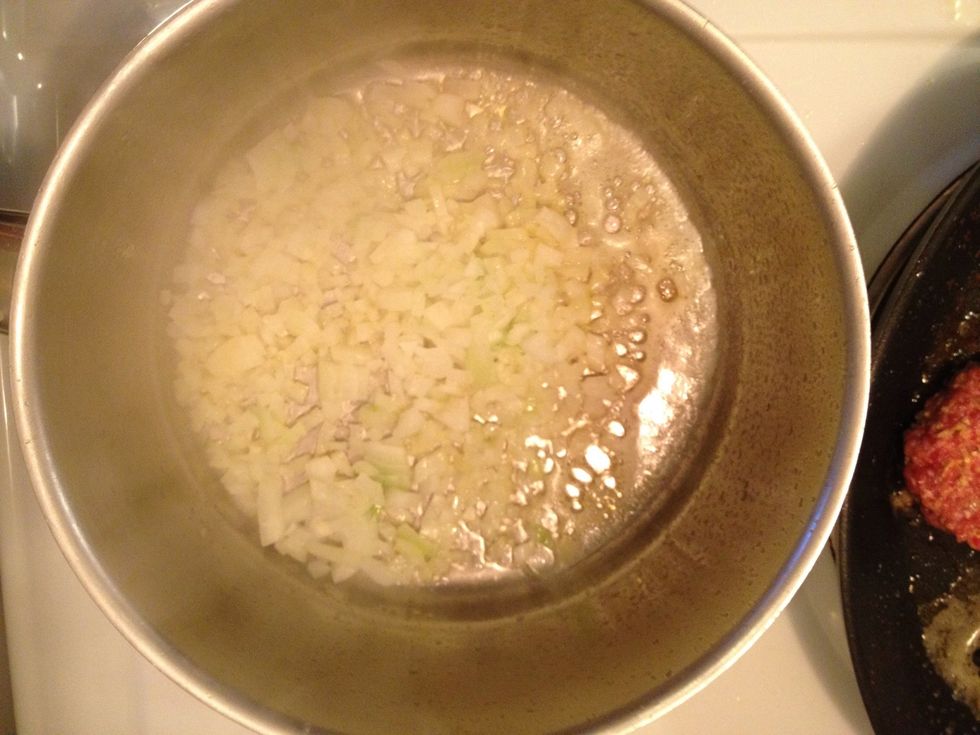Fry a small onion in some butter