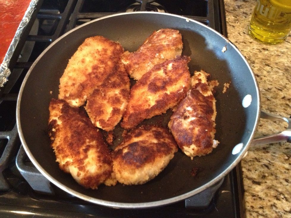 Fry all pieces till they are a nice brown then place in your baking dish with spaghetti sauce.