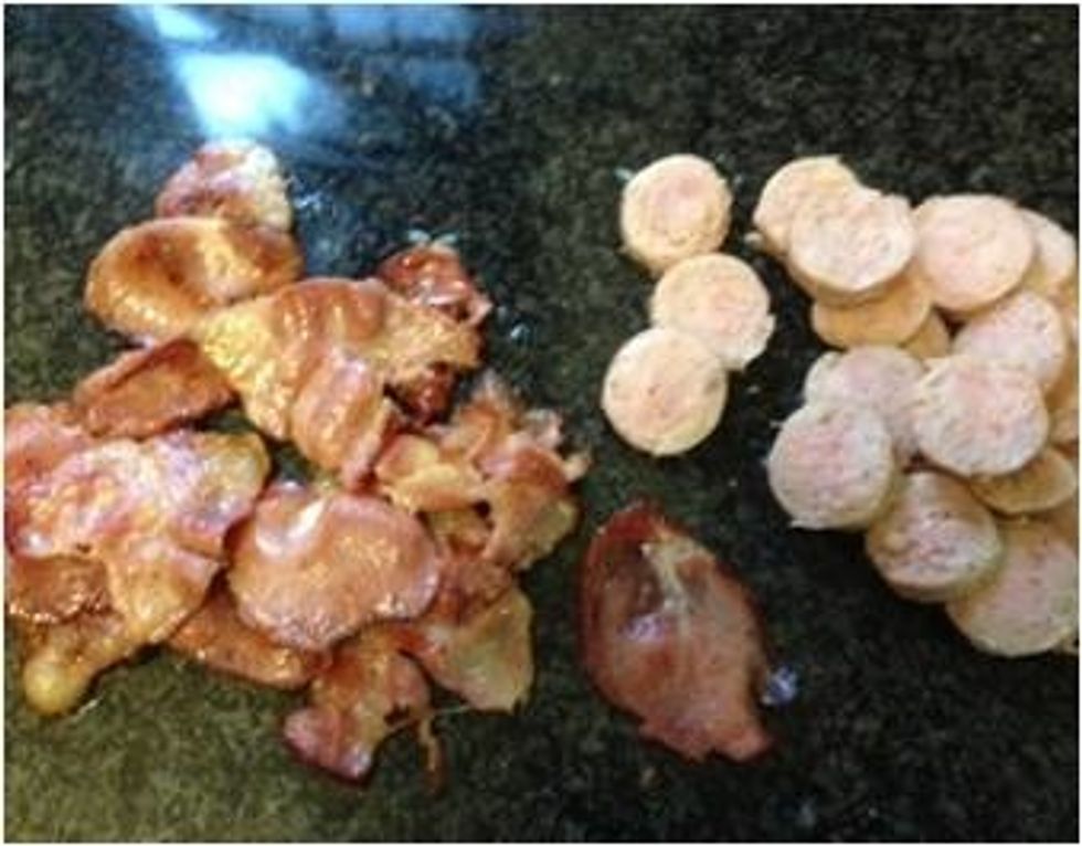 Fry bacon and sausage in butter until well cooked NOTE: 2 bacon ranches and 1 sausage per omelet