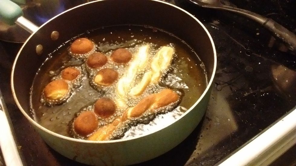 Fry balls till golden brown