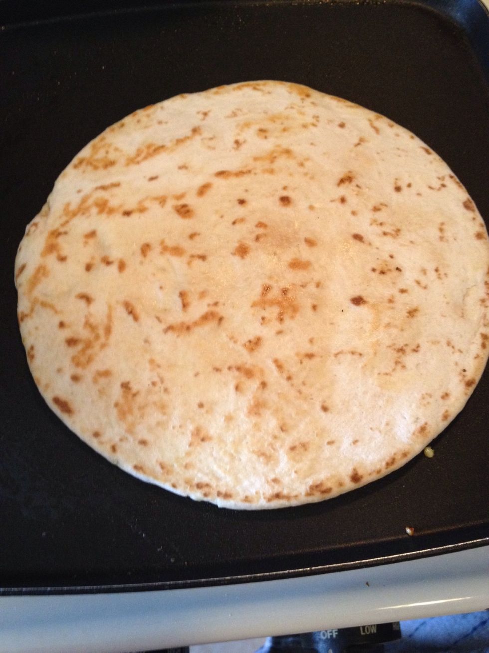 Fry both tortillas on each side