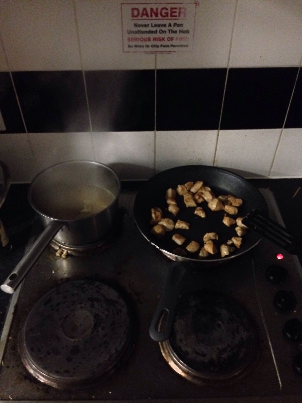 Fry chicken and boil spaghetti