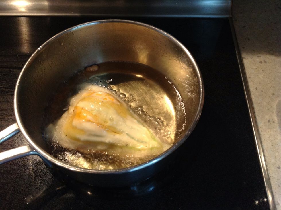 Fry for 2 minutes. I didn't have enough oil, but it still worked...though the end product looked a little flatter because of the shallow oil.