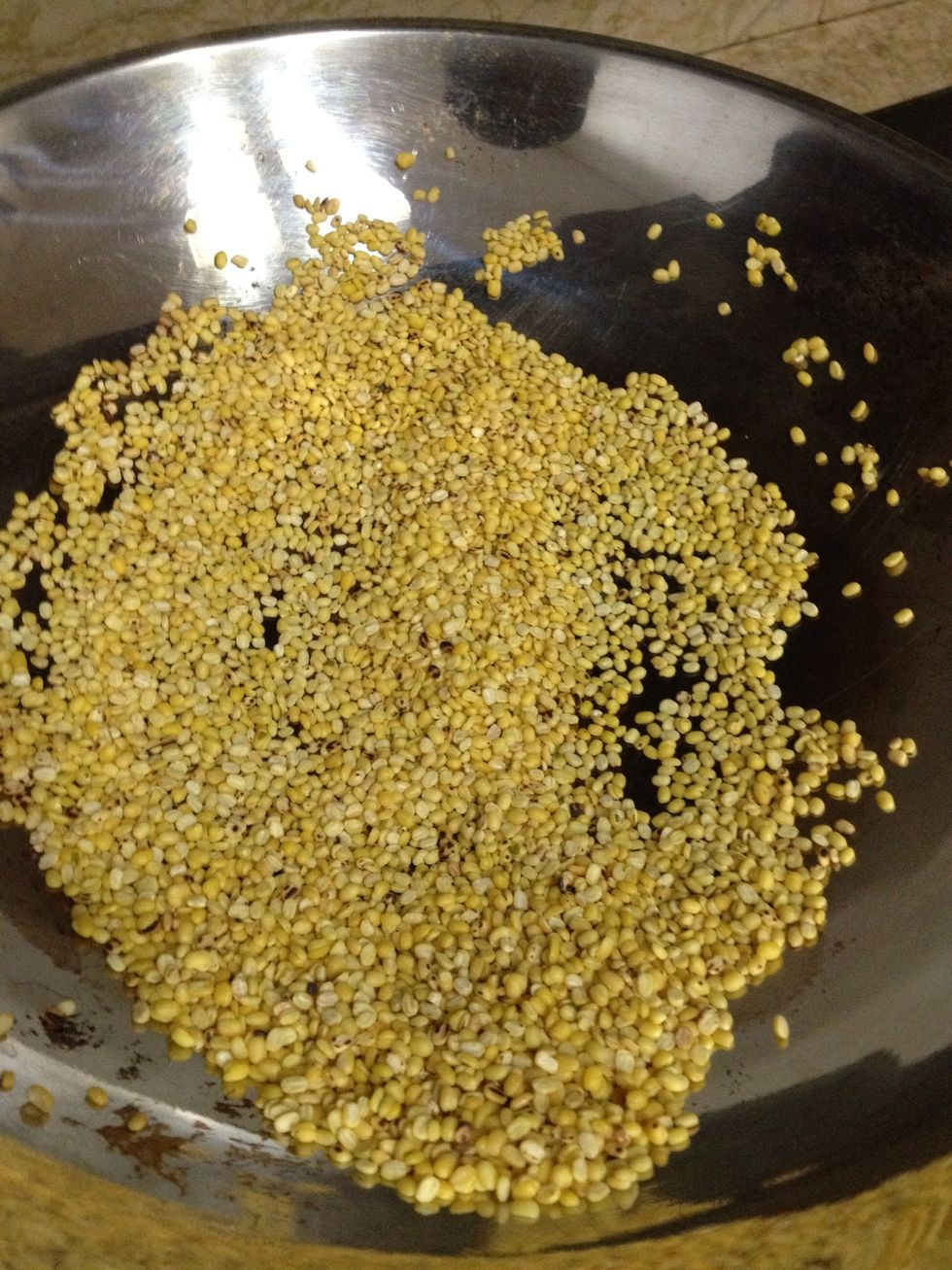 Fry green beans on a pan fry, with light fires, make sure don't let it burn