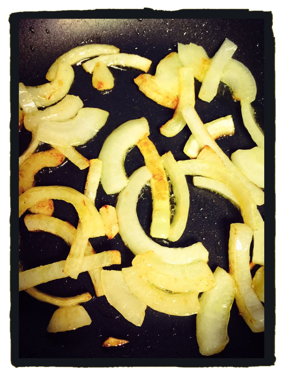 Fry half onion in some olive oil till transparent.