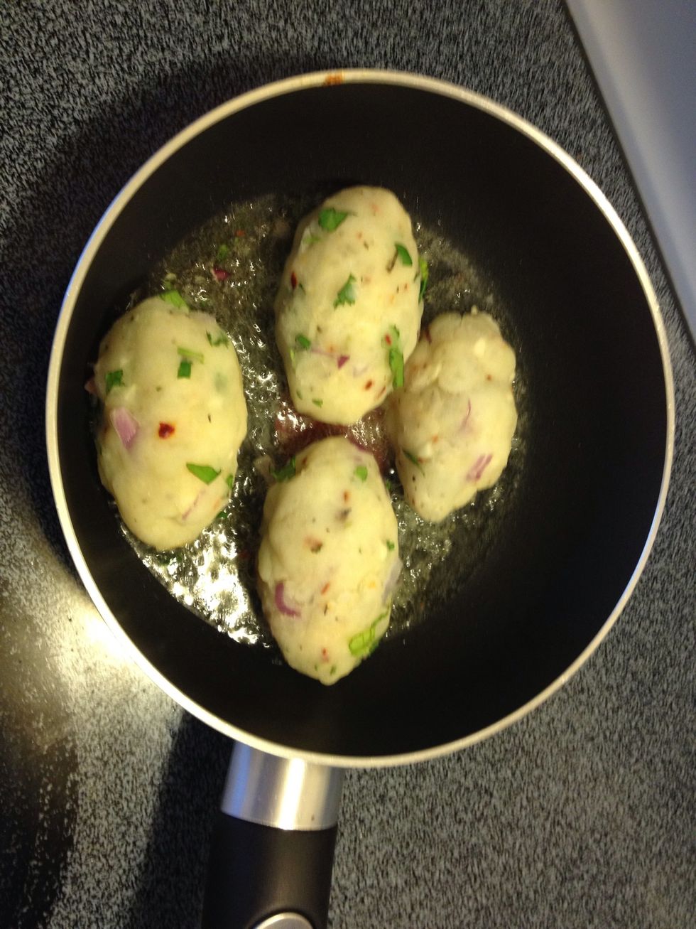 Fry in 2-3 tbsp oil on medium heat until browned. You can also bake at 375 deg until golden brown (about 20-25 mins)