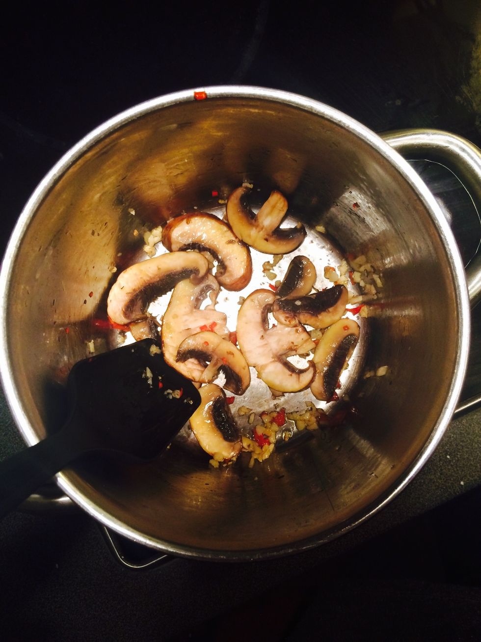Fry mushrooms, chilli and garlic
