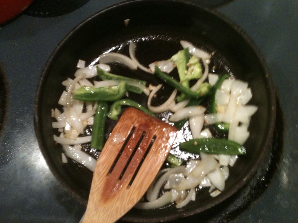 Fry onion and bell pepper until onion turns a little brownish.