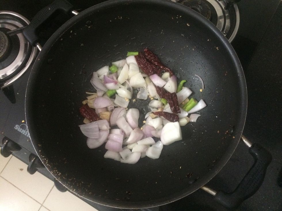 Fry onion, curry leaves, ginger, garlic, red chili and green chilli
