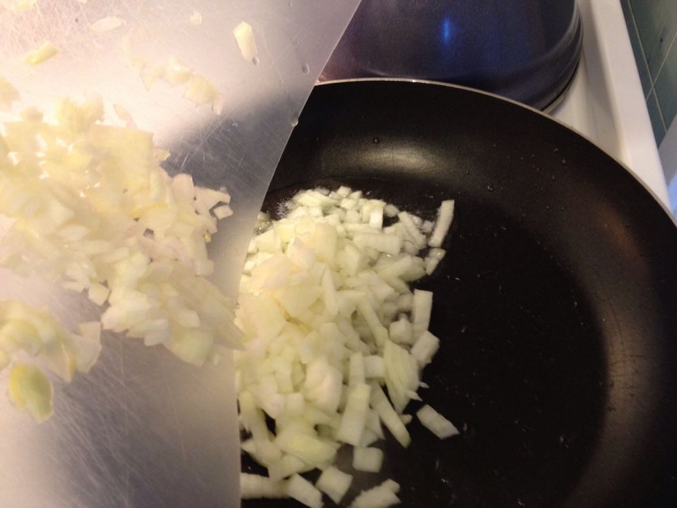 Fry onion in some olive oil.