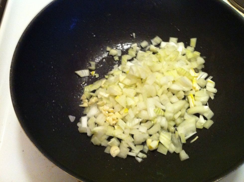 Fry onions and garlic until glossy.