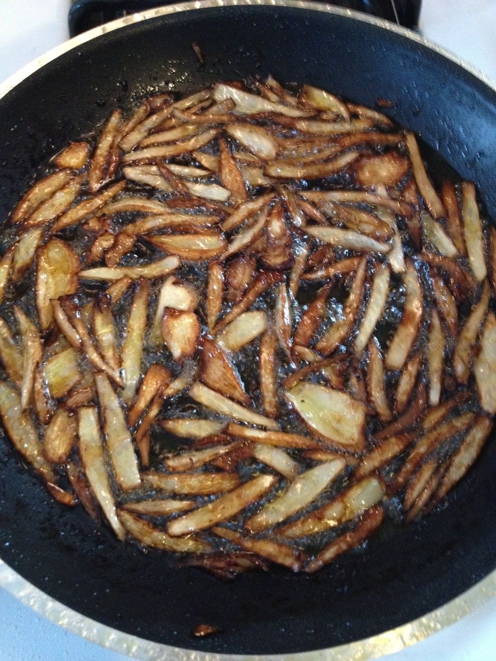 Fry onions until brown
