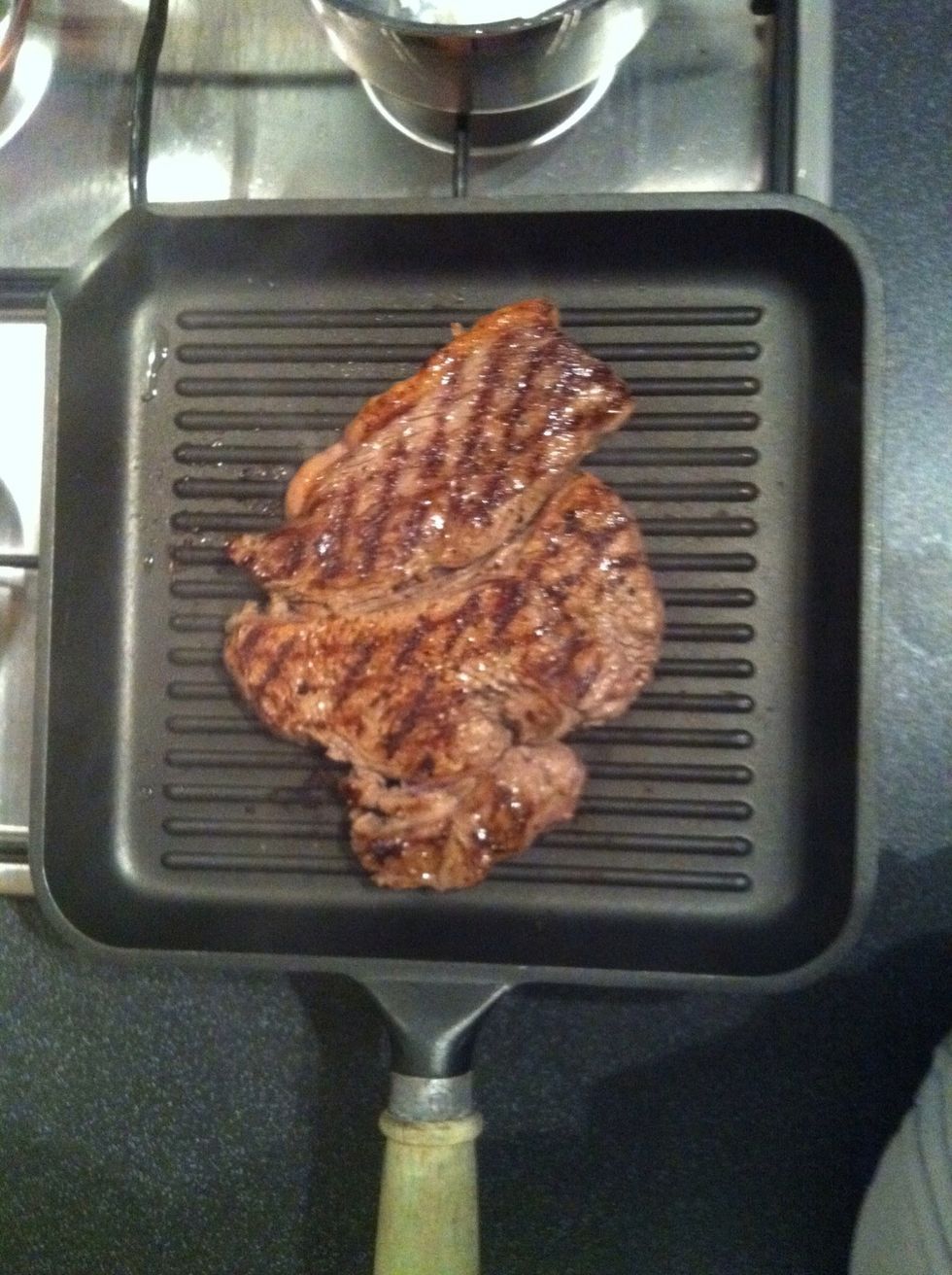 Fry other side of steak for 5 minutes and then take off pan and rest on a plate with foil wrapped over it. We will need those steak juices in a minute. Yum