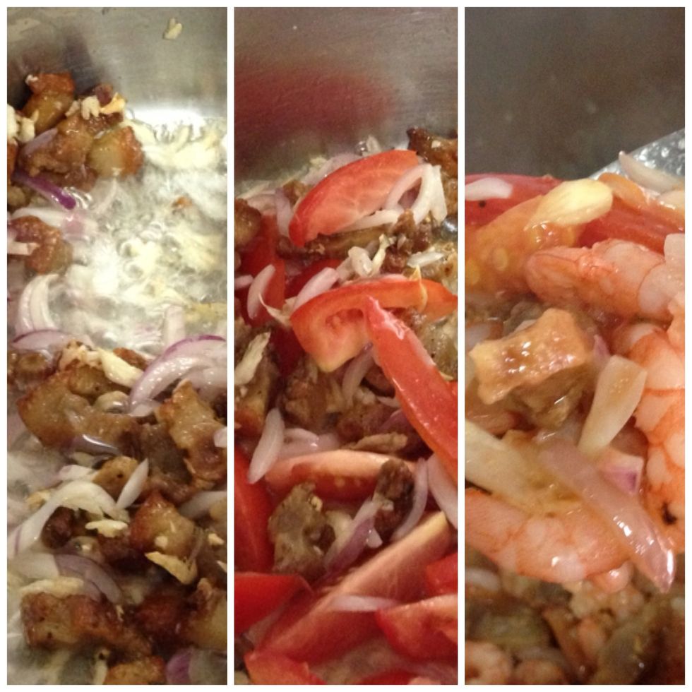 fry pork until brown and crunchy. add garlic and onions and saute. add tomatoes. add shrimp and stir ocassionaly.