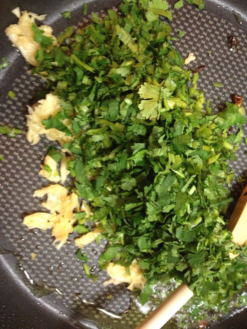Fry remaining garlic and cilantro in olive oil