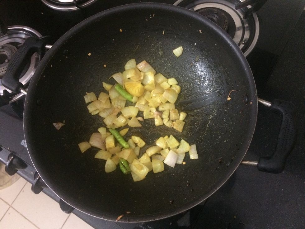 Fry some more onion and green Chilli. Add a bit of turmeric and salt