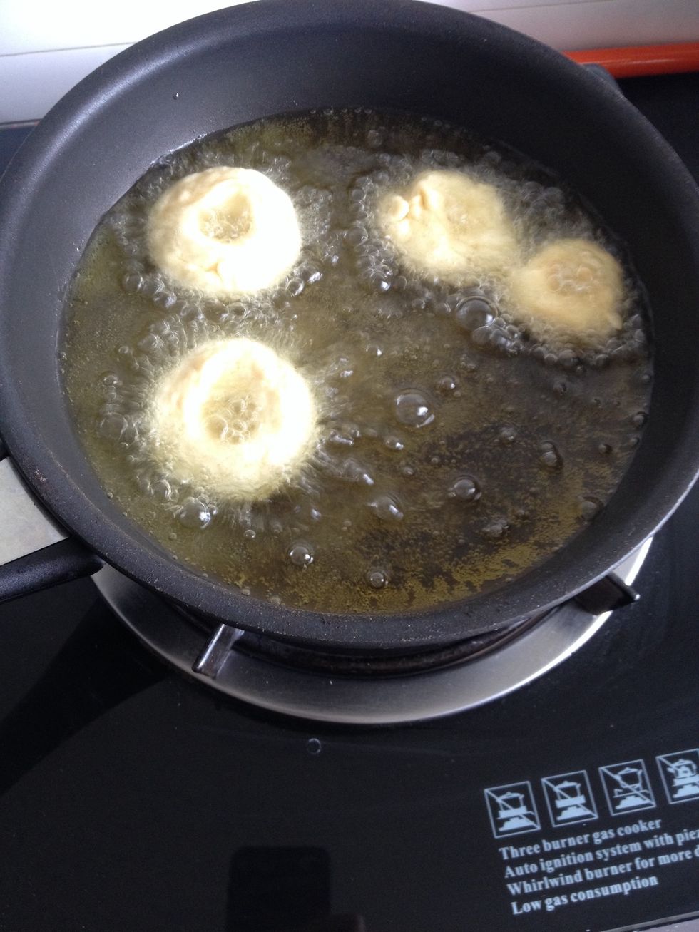Fry the doughnuts in hot oil. Making sure you don't over fry or burn them! They cook pretty quick.