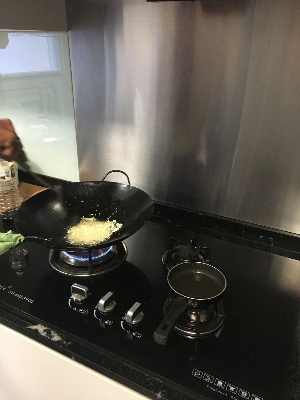 Fry the garlic in first. Give it a good stir for about 4-5 times.