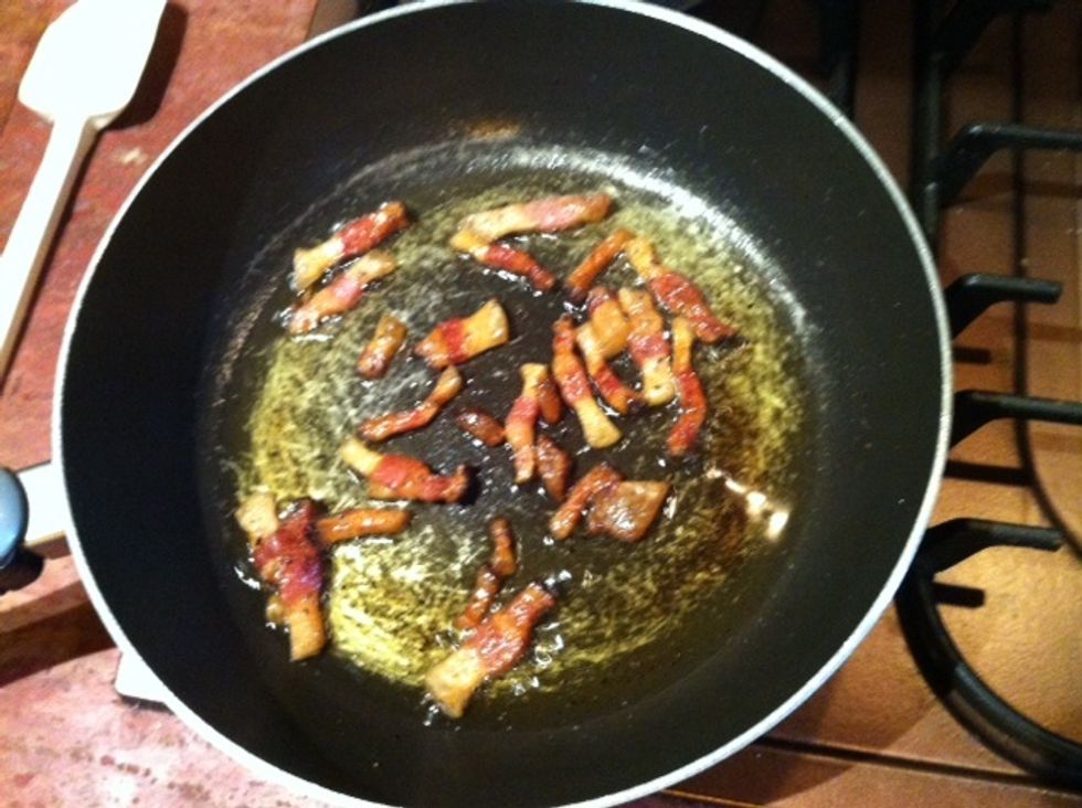 Fry the guanciale with the olive oil