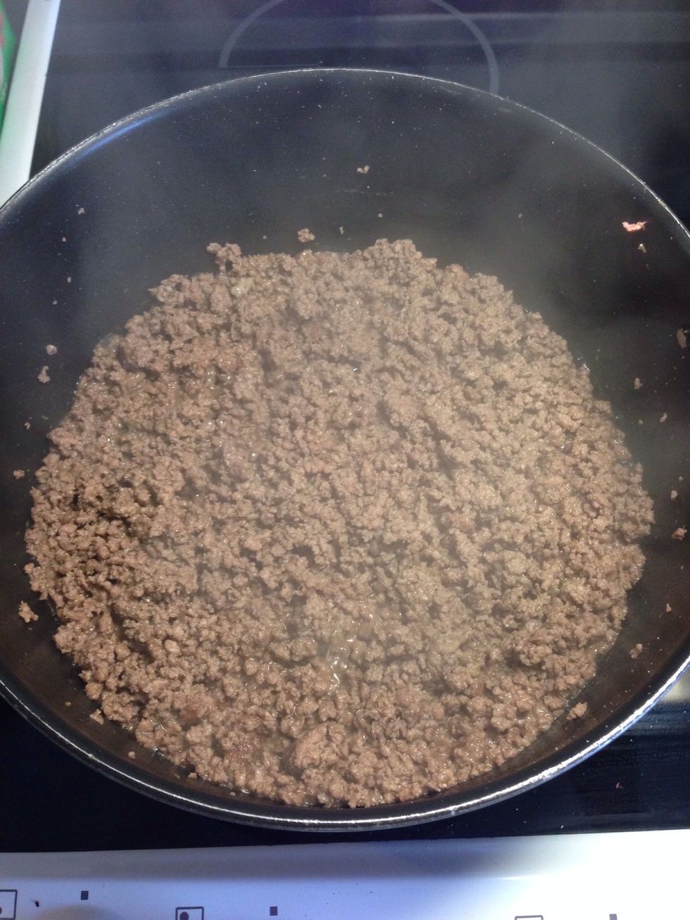 Fry the hamburger untill done, add finely chopped onion