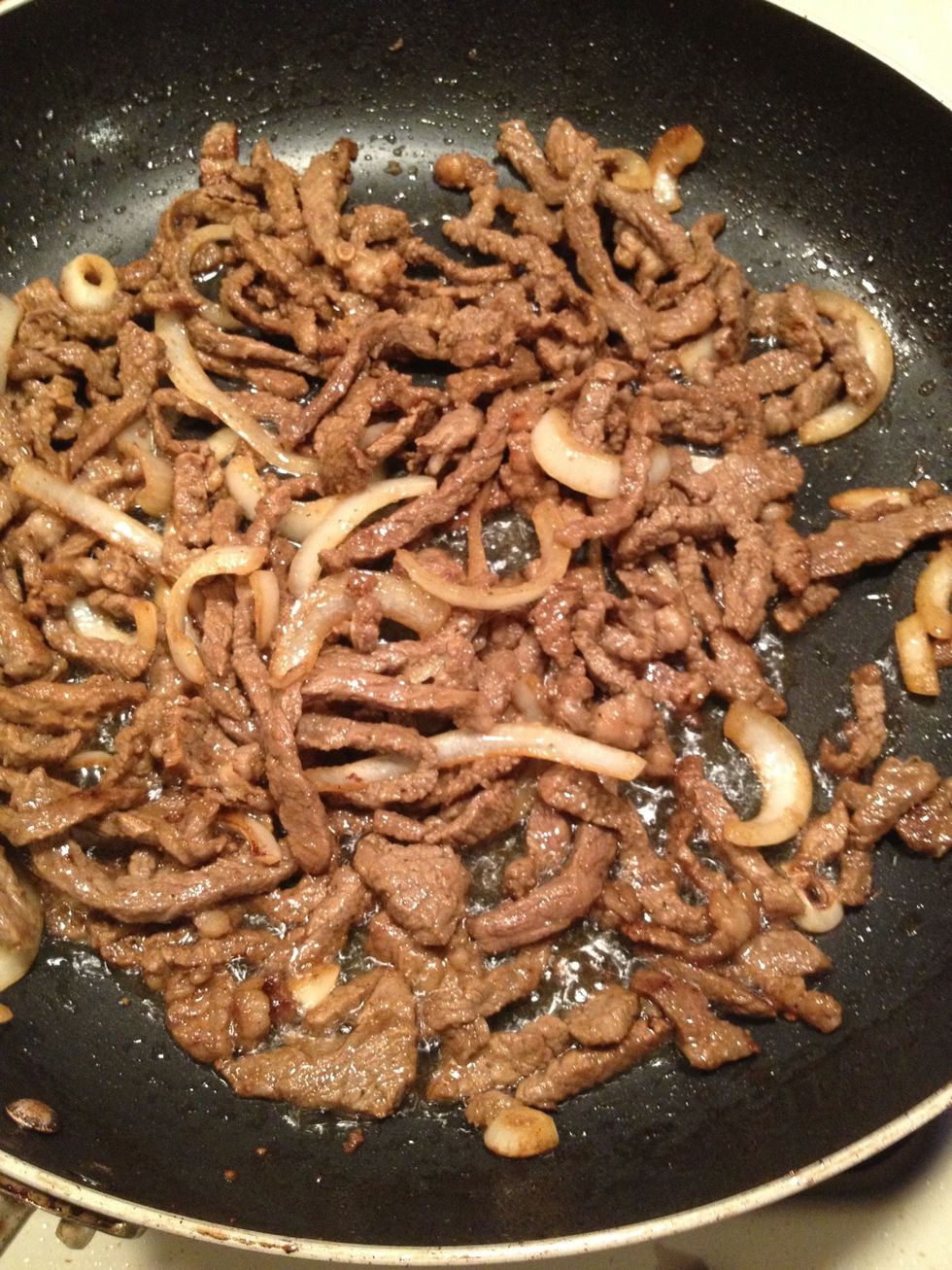 Fry the onions and beef for 2-3 minutes over high heat, add a little bit of oil if its dry . Set aside when done, keeping it warm ofcourse\ud83d\ude0a