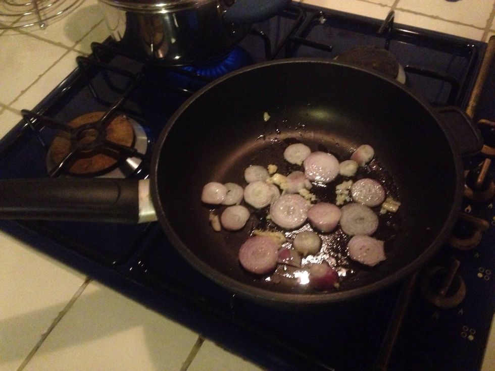 Fry the onions and garlic in a deep pan