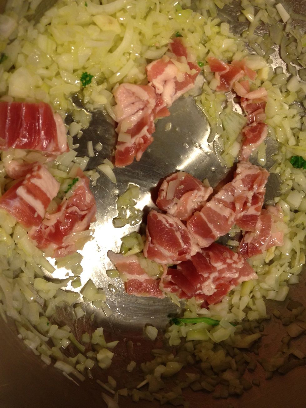 Fry the onions to medium head and add bacon.