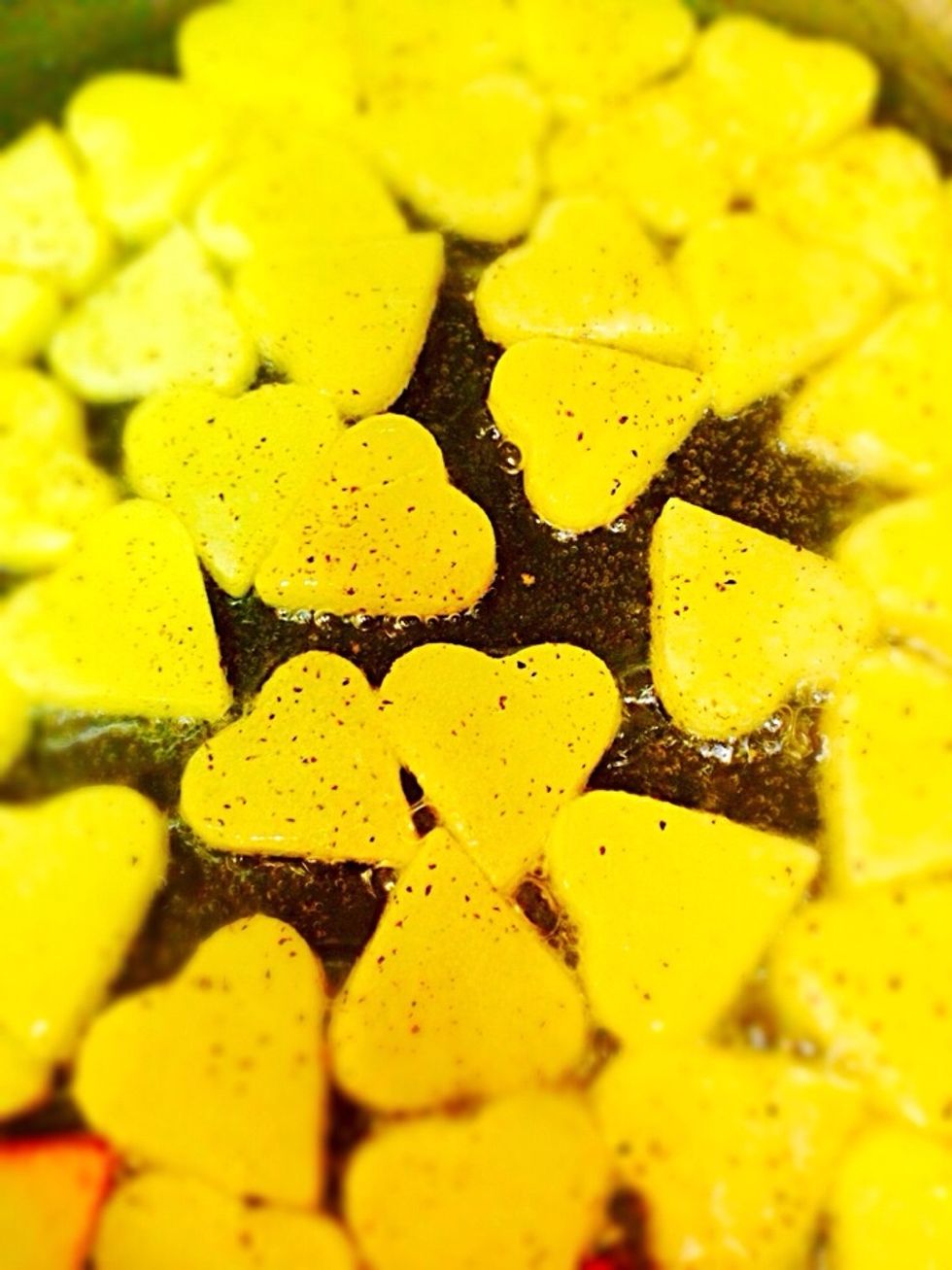 Fry the potato hearts in some canola oil. Season with salt and pepper