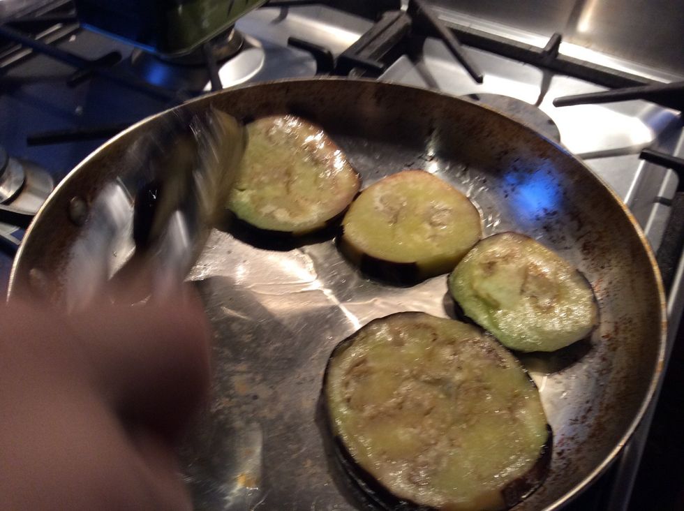 Fry the salted eggplant till tender in olive oil the Lay out on kitchen paper.
