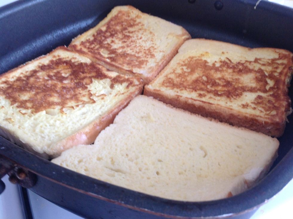 Fry the slices of bread lightly on each side for a few seconds.