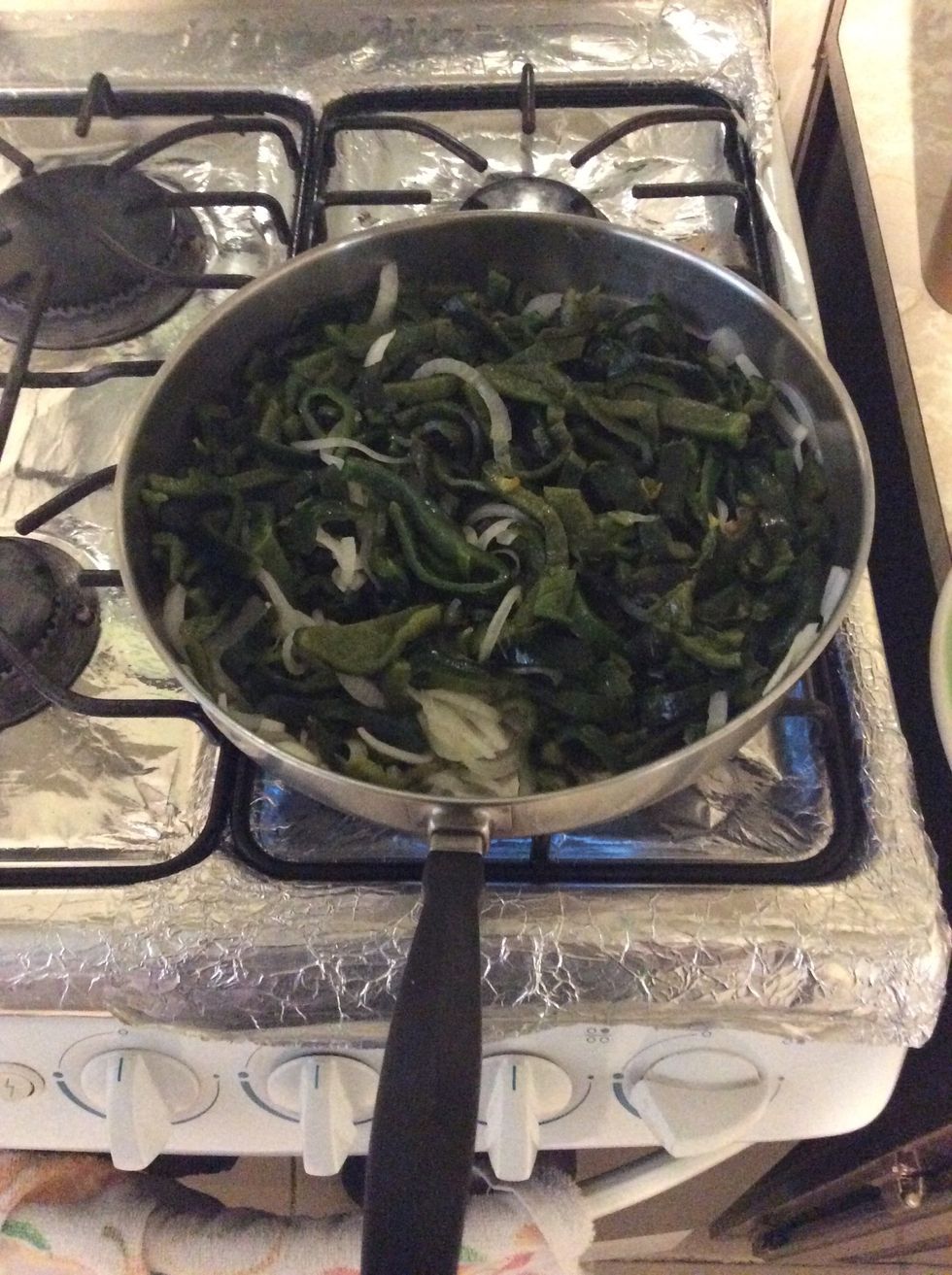 Fry the slices of chilies with the onion
