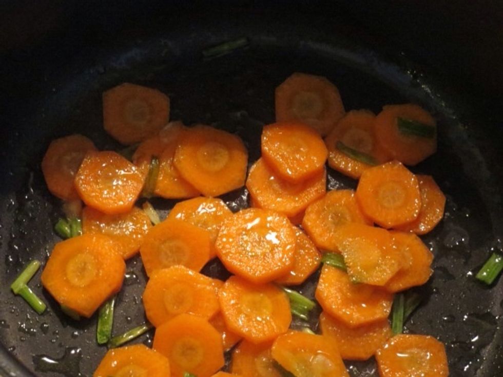 Fry the spring onion first when the fry pan is properly heated. then carrot, and then potatoes and paprika. I love the smell of fried spring onion. :)