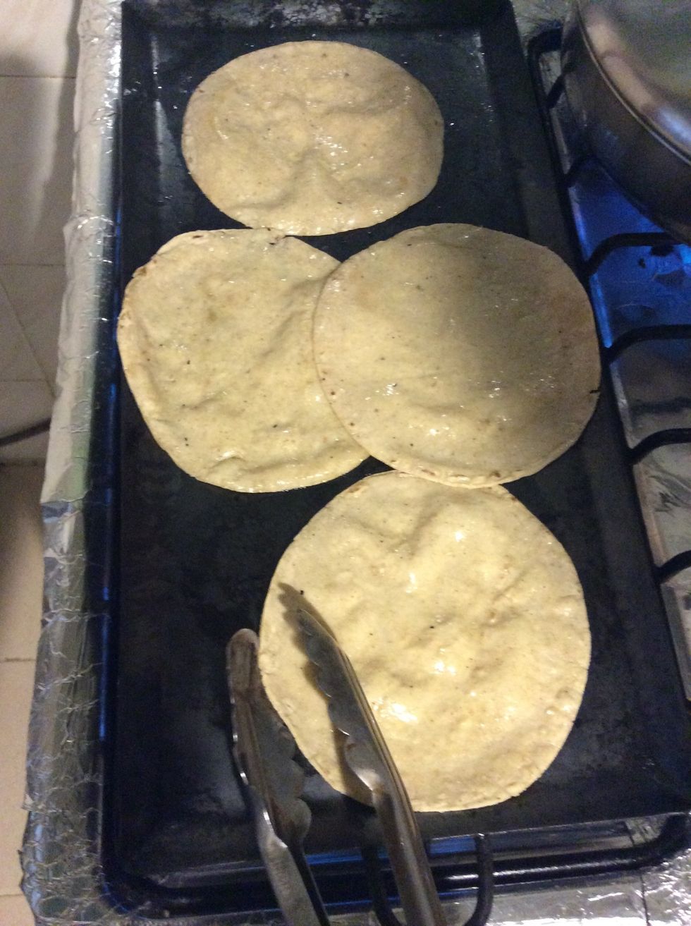 Fry the tortillas with oil on both sides without letting them brown