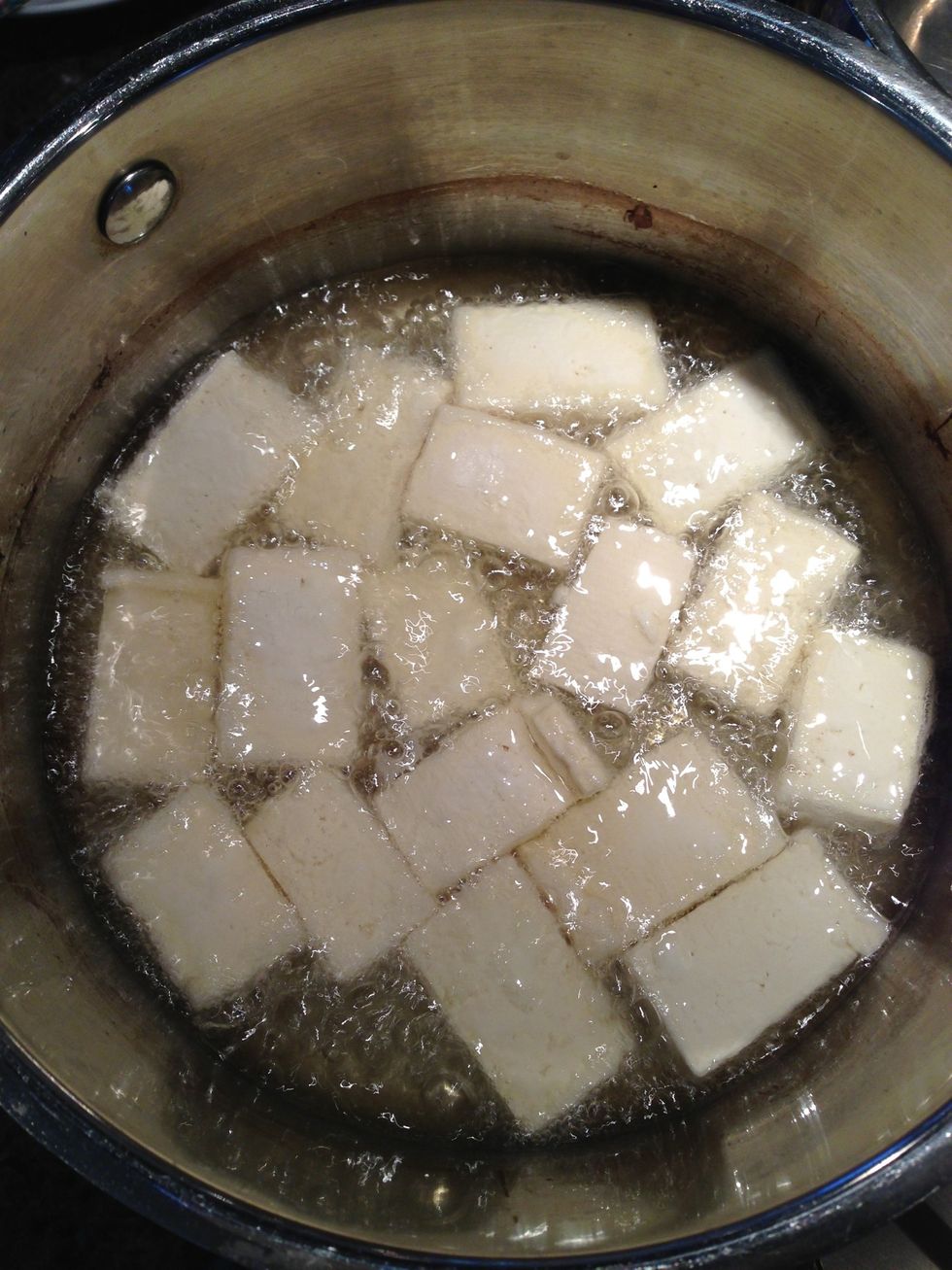 Fry until golden brown on one side, then flip.