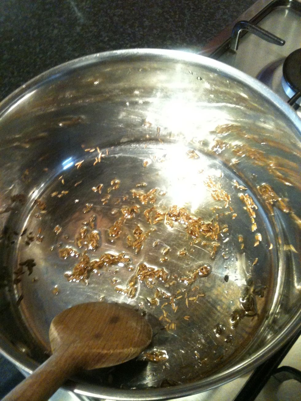 Fry up the cumin seeds in the oil for about 1 minute on a medium heat. Do not burn :)