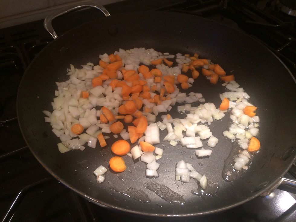 Fry veggies starting with "harder" ones first
