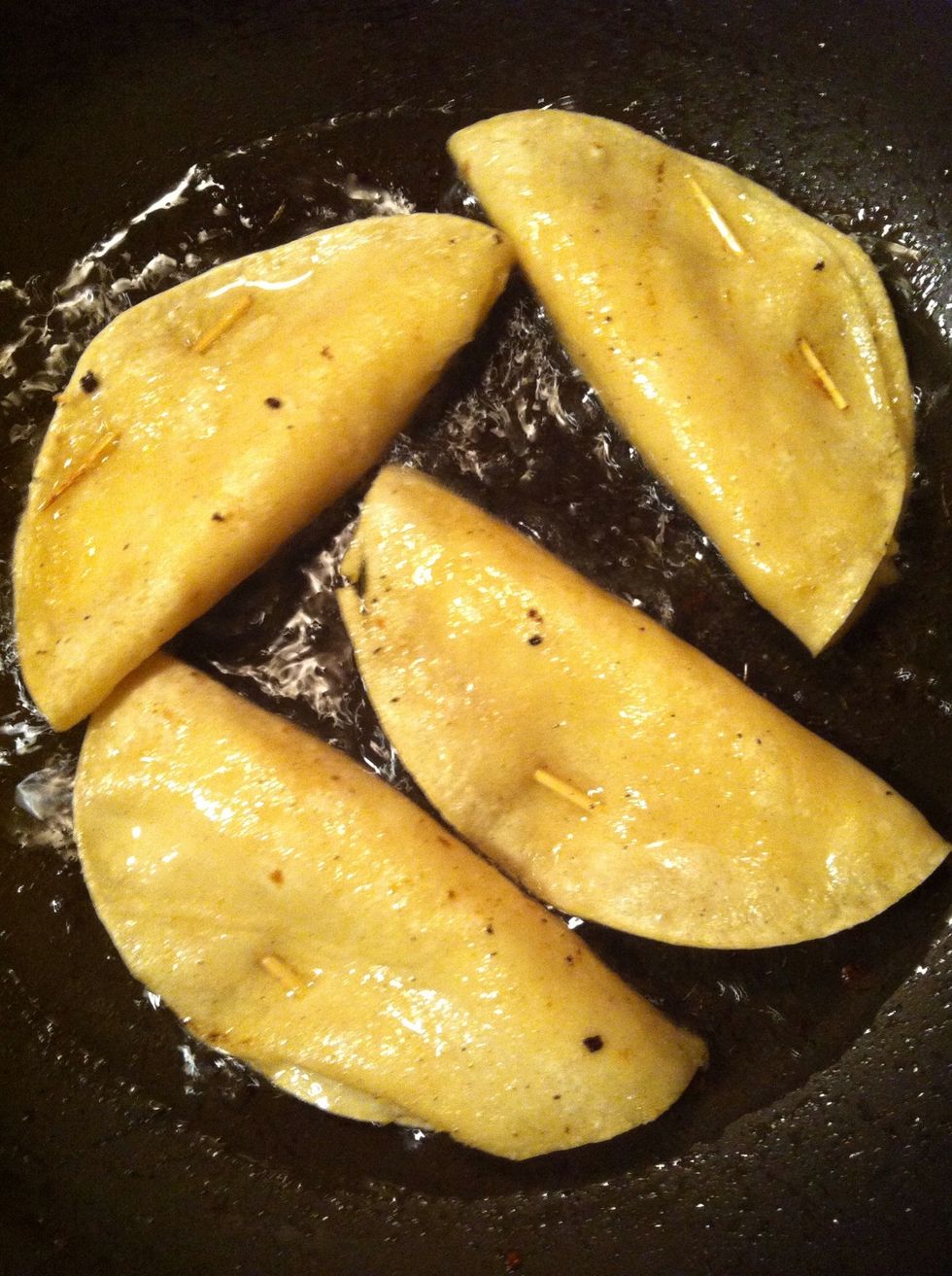 Fry your tacos until golden brown.