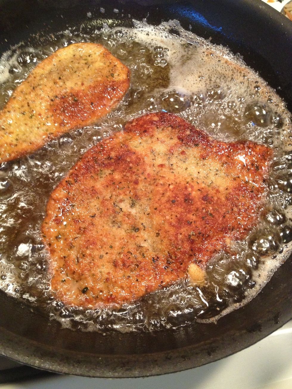 Frying until golden brown on both sides . This should take 2-3 minutes each side. Do not overcook, veal has a tendency to dry out.