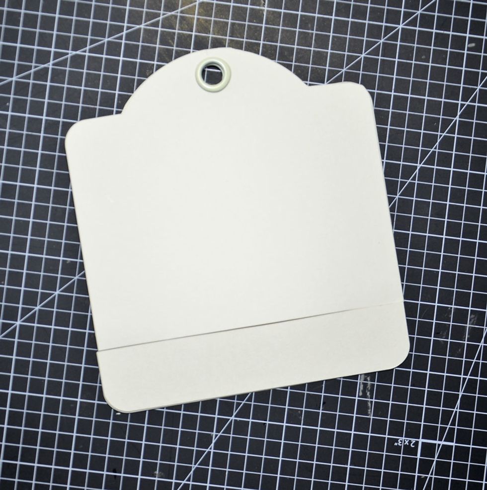 Fully closed and the size of the original square tag. Ready for you to embellish any was you choose.